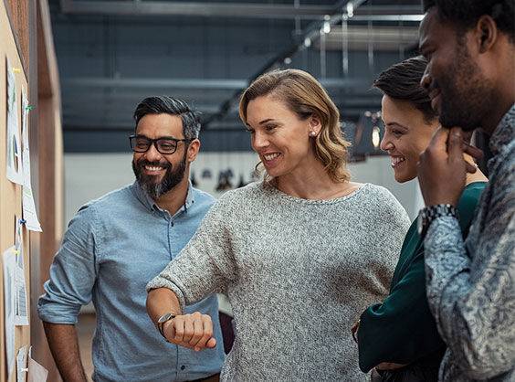 Group of smiling people at work